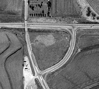 Figure 2. Aerial photo of grade-separated intersection, U.S. 59 and U.S. 34. Figure 1. Directional median opening and median u-turn.