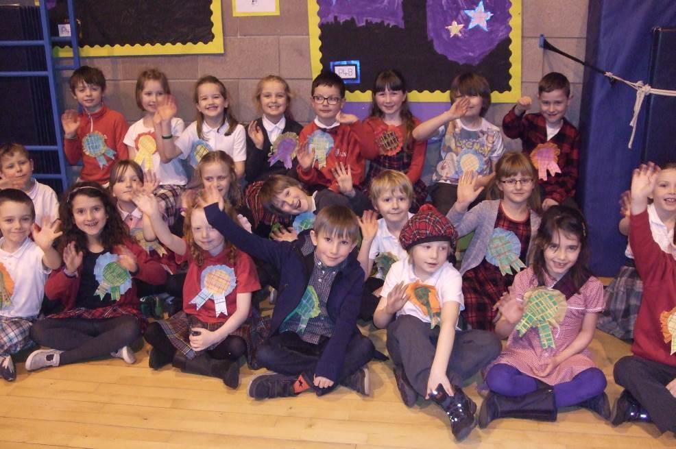 It was the school Ceilidh on Tuesday. We got dressed up in our super tartan Ceilidh outfits at home and made rosettes to wear.
