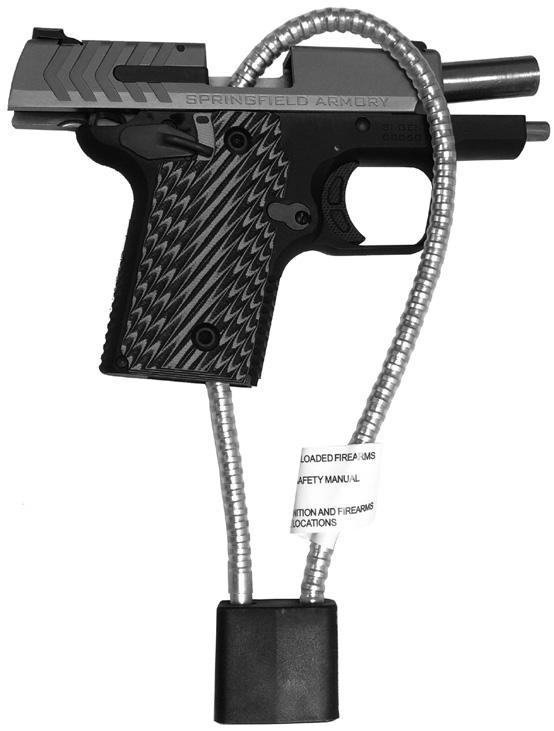 CABLE LOCK Step 1 - Point firearm in safe direction while keeping your finger off the trigger. Step 2 - Press magazine release and remove magazine. Step 3 - Pull slide fully to the rear and lock open.