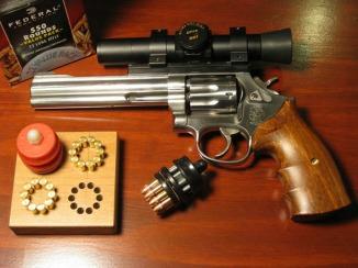 22 REVOLVER, using a 2 hand hold Second, Jim Grabbe, scoring 277-5 "X"'s, shooting a