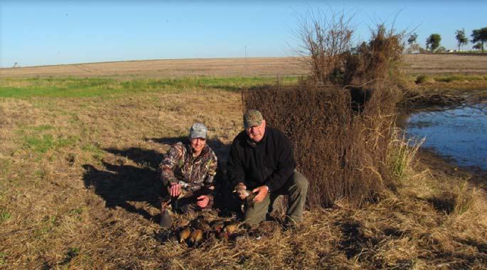 Chris Collinvitti and Ted Preston with teal ducks killed on the fi rst morning of duck hunting. for all hunting while in Uruguay, even for the duck hunting.