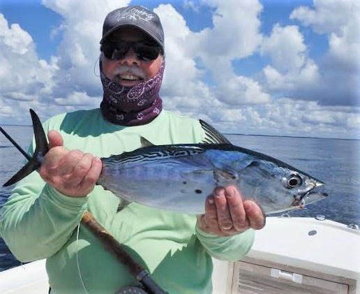 Here are some shots of happy anglers that felt the FA rush in July: club member Mike Broughton on July 1, Jay Lanier on July 5, Dave Walters on July 6, and