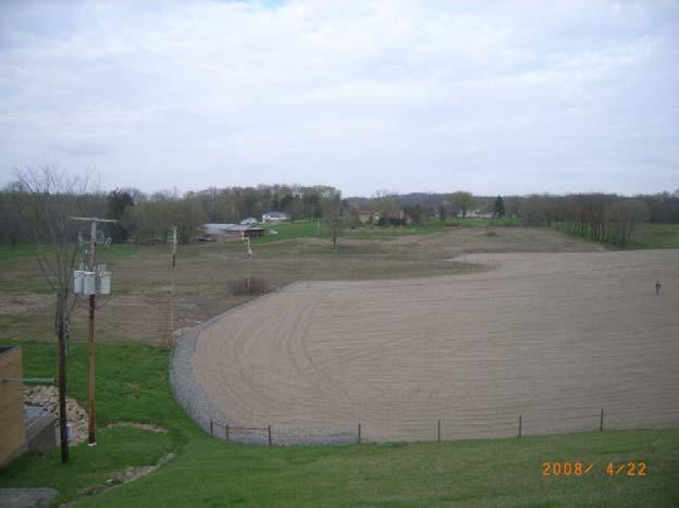 This is a photograph of the completed gravel seepage blanket placed in March 2008. Ultimately, approximately 6 feet of gravel was placed over the interior of the Rock Knoll at Zoar Levee.
