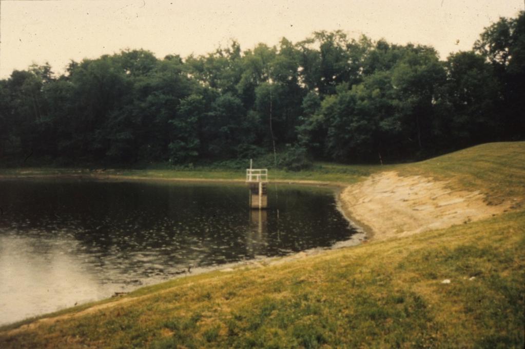 A drainage system was added to safely control seepage exiting the face of the dam.
