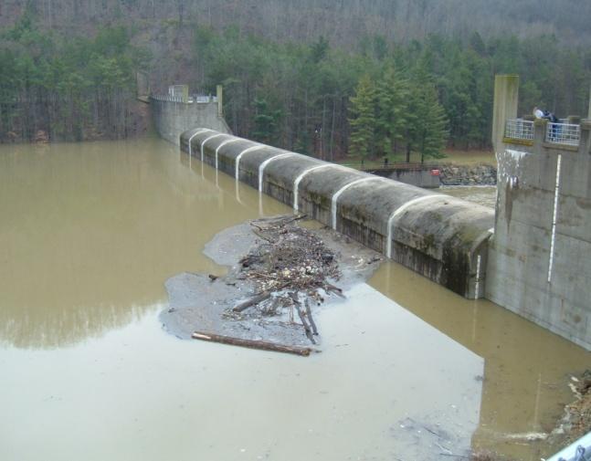 To the right is a picture of water impounded to elevation 907.4 feet in January 2005 behind Dover Dam.