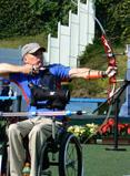 In a wheelchair - Issues with both hands Some archers have disabilities in both hands, but they need assistive devices to hold the bow or