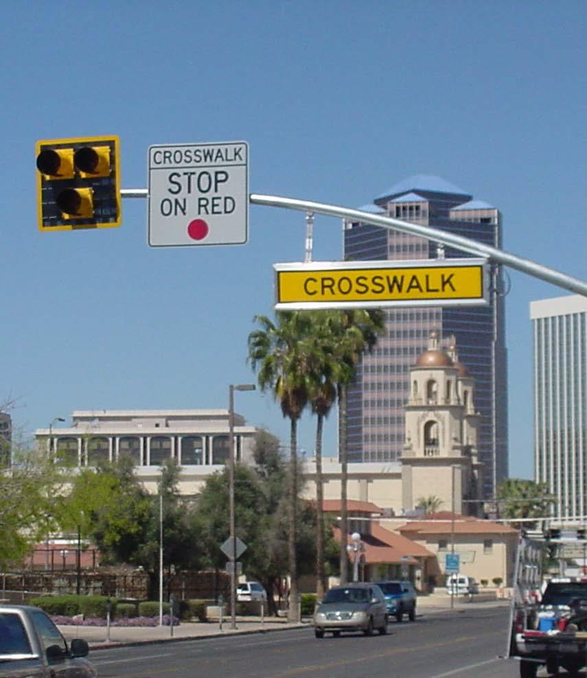 Pedestrian Hybrid Beacon: HAWK Chapter 4F of the MUTCD Tucson has more than 100 Provides crossing opportunities without attracting unwanted