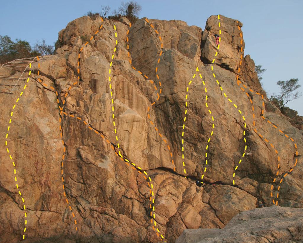 Hong Kong Bouldering Eagle Crag 1 - The Gift *** - F7a A superb line. Thin moves into the shallow scoop lead to even thinner moves at the top of the wall. F.A. P. Collis & M.