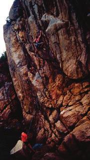 Eagle Crag 7 - S & M ** - F7c Follow a short vertical crack before making hard moves right to a good hold.