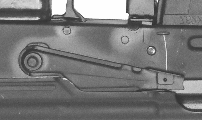 Magazine release lever 12. Triggerguard 13. Trigger 14. Pistol Grip Safety: The safety lever is in the SAFE position when it is moved to its uppermost (top position) on the receiver.