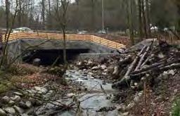 Unusual Accomplishments Under Adverse Conditions Management of water (streamflow and groundwater) presented a challenge for the design and construction of the new bridge structure.