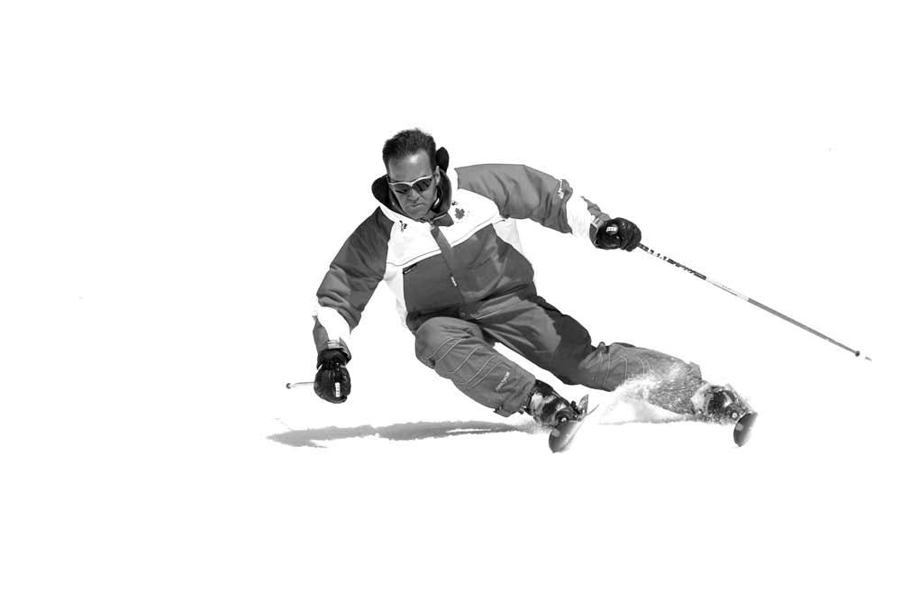 Forces in Skiing On a slope, gravity is divided into two components. One portion acts perpendicular to the slope and is opposed by an equal and opposite reaction force.