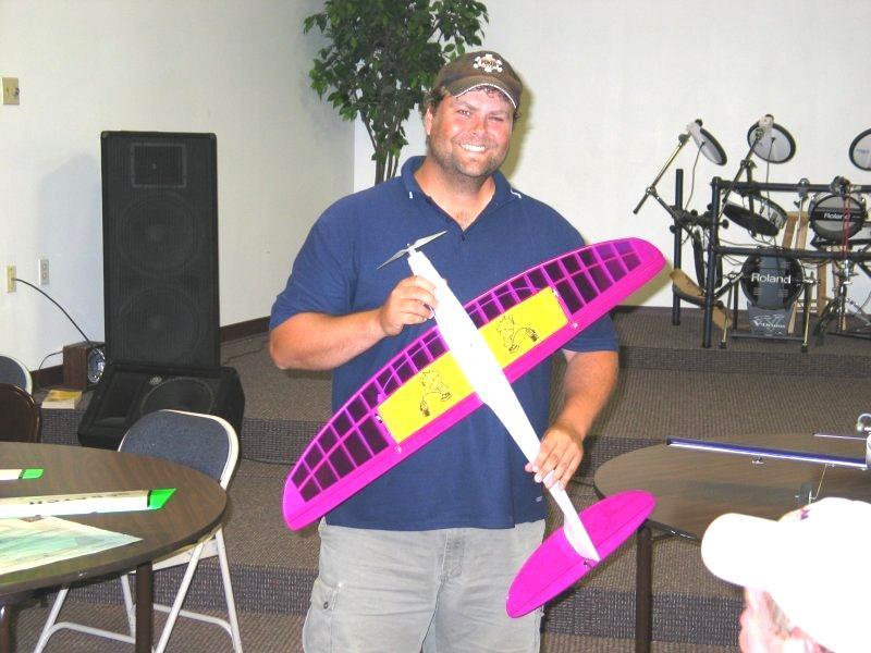The plane had air retracts, an 87-inch wingspan and weighed in at 24 pounds. This plane originally belonged to Mike Prokop.