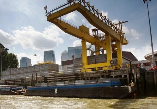 The mooring arrangements for tidal berths on the Thames are generally provided in one of two ways; standard fixed bollards located at the top of the berth or mooring travellers located on the face of