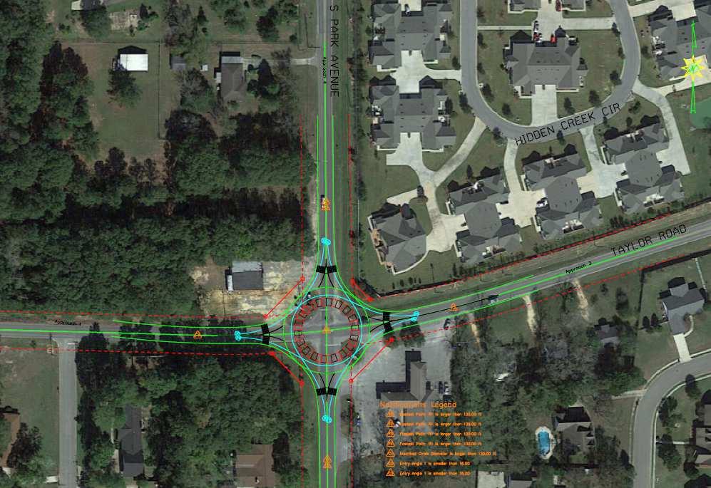 the preliminary traffic signal and roundabout analysis. Figure 20 shows the roundabout concept at this intersection.