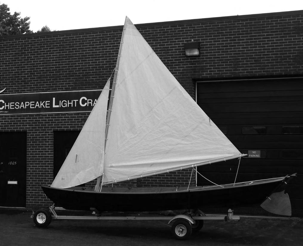 The sloop-rigged Northeaster Dory. Could use a little more downhaul tension, or a little less outhaul tension, to take that wrinkle out of the foot of the sail. Have fun!