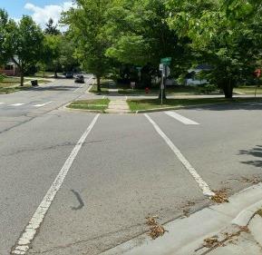 At these unmarked crosswalks or even at mid-block crossings, pedestrians are legally allowed to cross the street.