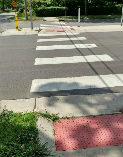 (2) a high-visibility crosswalk pattern, such as a ladder, continental design, or diagonal marking.
