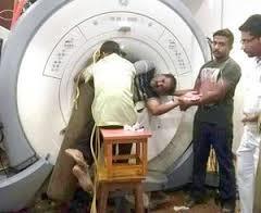 Emergencies Pinned Person If an object pins someone to an MRI machine, determine the severity of the victim s injuries and whether he/she can be removed.