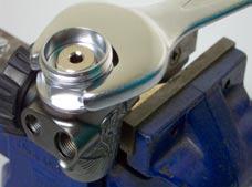 6. Insert the threaded end of the Handwheel Connector through the