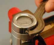 Ensure that the pin spanner is sitting flush to avoid damage to the end cap.