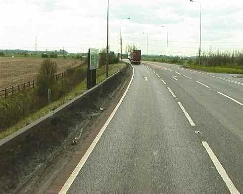 Figure 7 Example of refuge lane for right turning traffic on a derestricted single