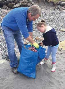 KNOW YOUR WASTE. Alex Crowley doing a#2minutebeachclean with his daughter, Mary Kate. A two minute beach clean might seem insignificant in the grand scheme of things but it is important.
