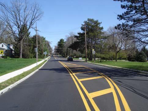 Two (2) 12-foot travel lanes with a 10-foot striped shoulder along the northbound lane 2. Two (2) 12-foot travel lanes with a 12-foot center left turn lane 3.