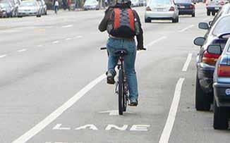 PLACE BIKE LANE SYMBOLS TO REDUCE WEAR BICYCLE LANE Bike lane word, symbol, and/or arrow markings (MUTCD Figure 9C-3) shall be placed outside of the motor vehicle tread path in order to minimize wear