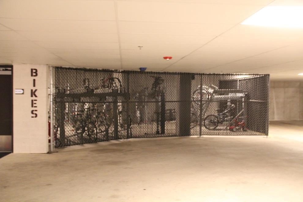 Examples are bike cages, bike rooms, and bike lockers.