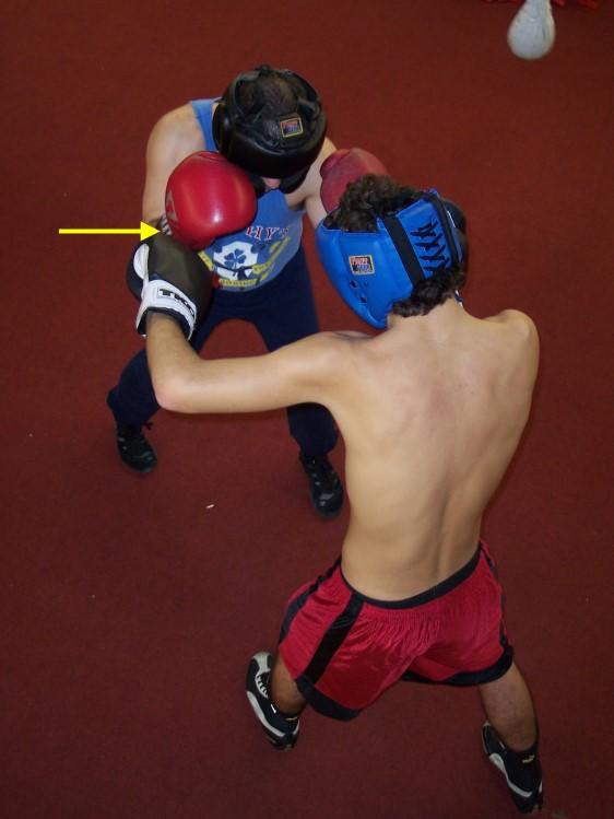 Keeping elbow down 3 connecting with attackers forearm 2 deflecting