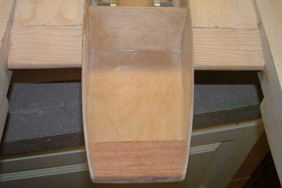 Step #12: The nose of the boat is strengthened using a piece of hardwood sanded to shape. Glue this in with epoxy. See figure 8 Figure 8.
