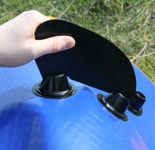 For the side Fins, take each Fin and hook them into place making sure that the longer portion is going towards the end of the board.
