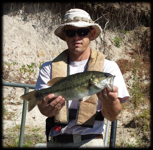 Above: Hard fighting Spotted Bass provide enjoyable river fishing experiences for anglers.