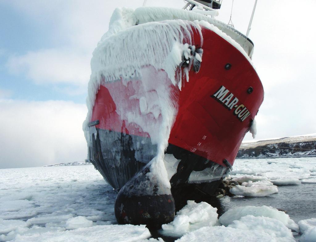 Photo: U.S. Coast Guard, Sector Anchorage Fishing vessel Mar-Gun grounded on St. George Island in the Bering Sea. Ice accumulated on its starboard side.
