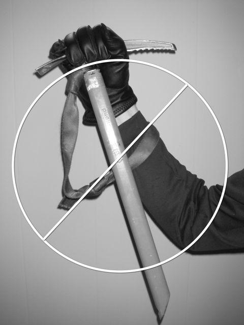 Whatever your starting configuration, you should dig the pick of your axe in to the snow using whichever hand is holding it and using your other hand on the shaft for control.