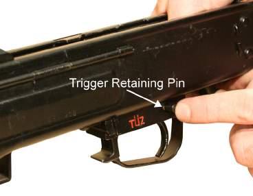 5. Install the trigger retaining pin from the left side of the receiver.