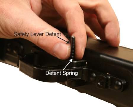 TM 8370-50107-IN/18 0012 00 6. Install the narrow end of the safety lever detent into the detent spring and install them into the left side of the receiver, detent spring first.