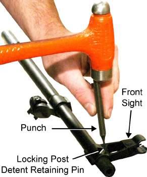 TM 8370-50107-IN/18 0013 00 3. Using a punch, drive the locking post detent retaining pin out. Refer to Figure 3.