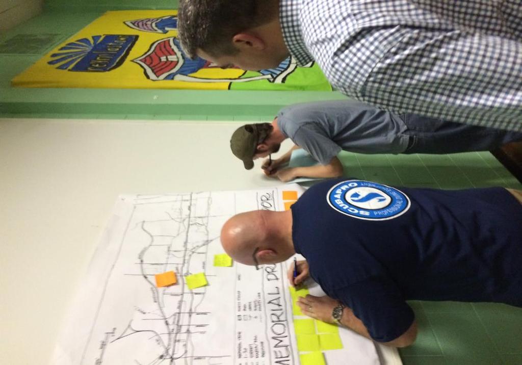 Residents writing suggestions on a map at a Reynoldstown Civic Improvement League meeting Outreach Action Plan Attended September and October meetings of many neighborhood associations and five NPUs