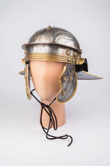 INFORMATION HELMET This type of helmet was known as a galea and was worn by legionaries. The different sections of the helmet protected the skull, the back of the neck and the sides of the face.