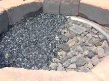 3) Apply top coat of glass to lava rock just deep enough to hide lava rock and ring.