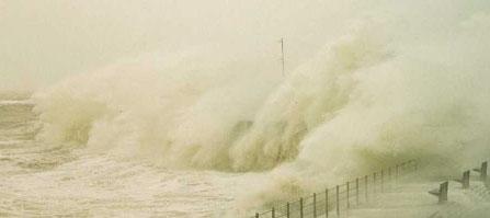 1 WAVE OVERTOPPING PROCESSES Overtopping which occurs when waves run up the face of the seawall or breakwater reach and pass over the crest of the wall, is often termed green water overtopping, see