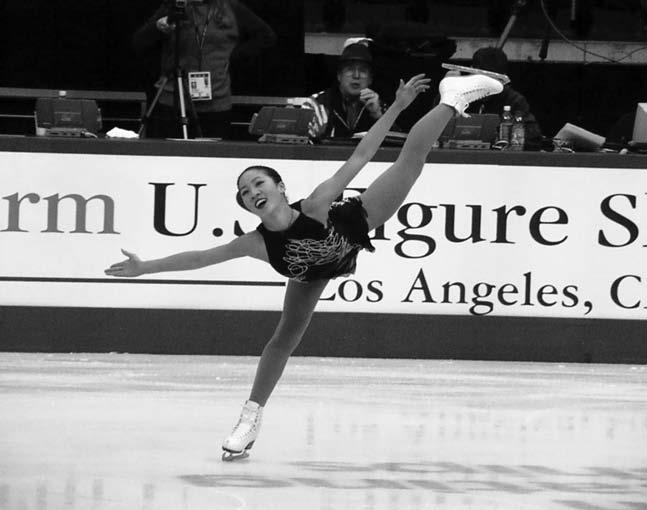 This story is about one of the best figure skaters of all time. Read the story. Then answer the questions that follow. Michelle Kwan Picture this. You are gliding on top of ice. You speed up.