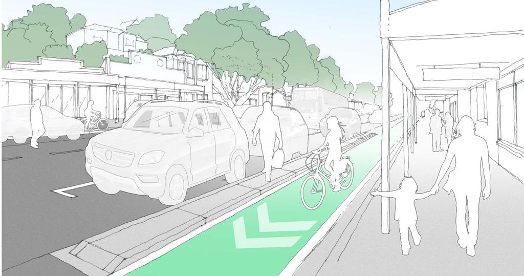 cycle way at road level Raised kerb separators provides a physical buffer space separating the