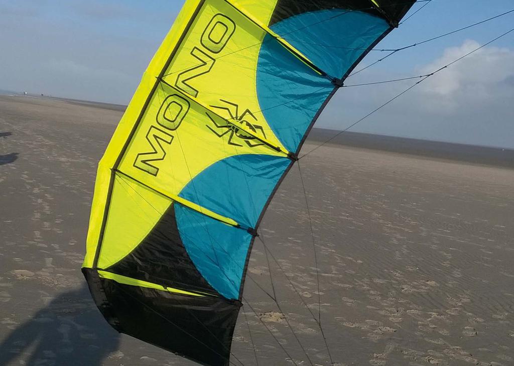 BY PULLING THE RED LINE, THE KITE IS LANDED BACKWARDS SECURED POSITION ON THE GROUND FOR A CROSSOVER BAR born to