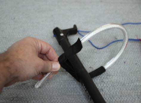 To do this, wrap the strap end around the bar and feed the other harness loop end