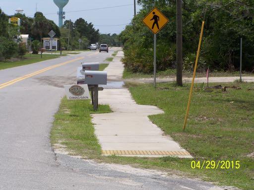 It was constructed in 2009 by Franklin County with Federal Stimulus funding through the Local Agency Program administered by the Florida Department of Transportation. The sidewalk is 5 feet wide.