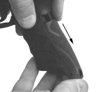position and push the grip panel up onto the grip rails (Figure 19).