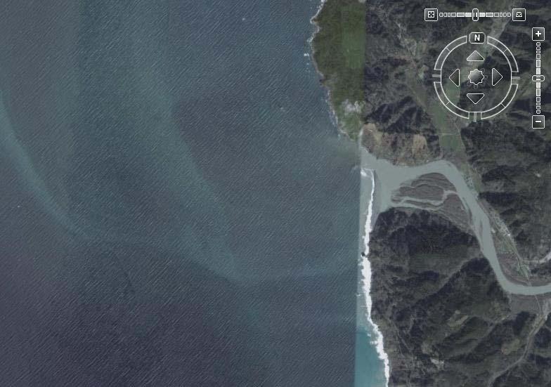 North West South Figure 2: Satellite photo showing the mouth of the Klamath River and the Pacific Ocean.